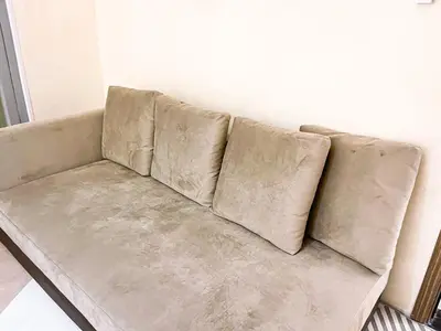 a couch sitting in a living room at Luxury 2BR Penthouse across City of Dreams in Manila