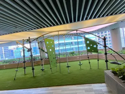 a playground with a climbing frame in a building at Air Residence Luxury condo in Manila