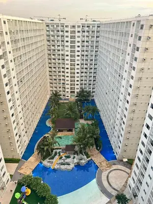 an aerial view of a resort with tall buildings at Affordable staycation at SHORE RESIDENCES Near MOA and NAIA in Manila