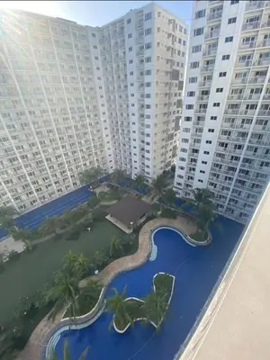 an aerial view of a resort with tall buildings at Stunning Hotel Feels at Shore in Manila