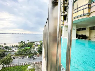 a view of the ocean from the balcony of a hotel at Stunning & Luxury 4BR in Manila Bay White Beach in Manila