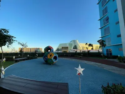 a playground with a star and a building in the background at Luxurious 2BR with Manila Bay Sunset II 6pax in Manila