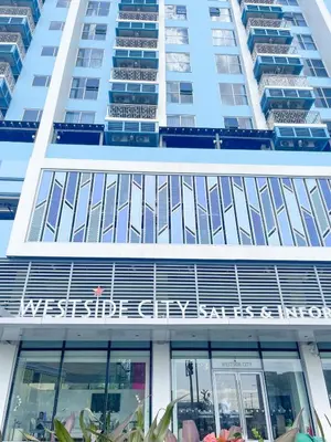 a tall building with a sign on the front of it at Modern Luxury 5BR Sunset View beside Okada Manila in Manila