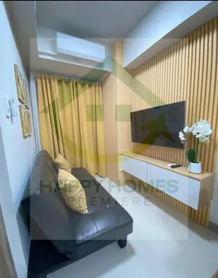 a rendering of a living room with a couch and a tv at Happy Sunshine at S Residences in Manila