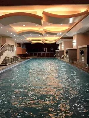 a large pool of water in a hotel room at Birch Tower Condominium Malate Manila by T&T in Manila
