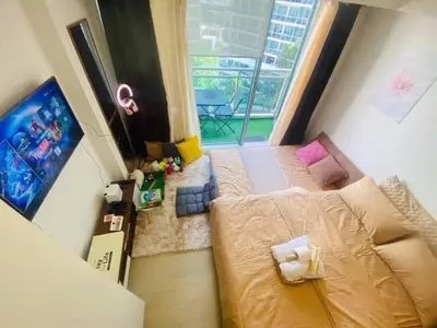 an overhead view of a bedroom with a bed and a window at Sole Sisters Staycation in Manila