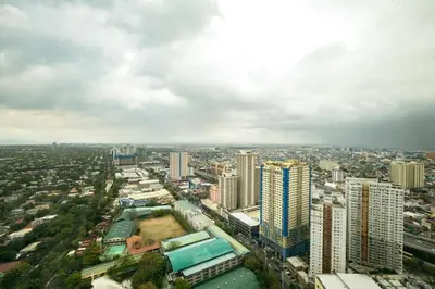 an aerial view of a city with tall buildings at Yūgen 幽玄 Makati Home - Malls, Little Tokyo, Pool in Manila