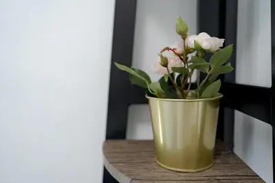 a vase with flowers in it sitting on a table at Free Parking! Beautiful 2BR Home in Central Makati in Manila