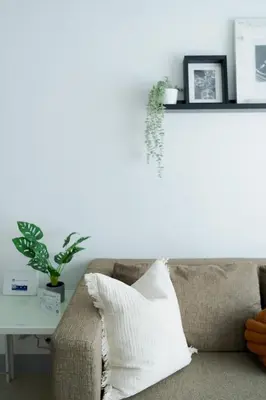 a living room with a couch and a table at Free Parking! Beautiful 2BR Home in Central Makati in Manila