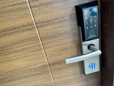a lock on a door with a key at Executive Suite Air Residence Style Comfort Makati 300 Mbps in Manila