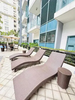 a row of benches and tables in a building at Across NAIA terminal 3 in Manila