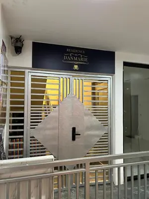 a large umbrella is on the front of a building at Modern Studio near MOA, Airport & Heart of Pasay in Manila