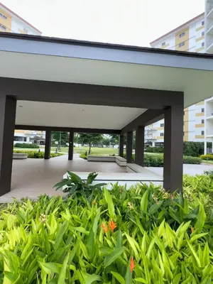 an external view of a building with plants at CASA Salcedo - Field Residences in Manila