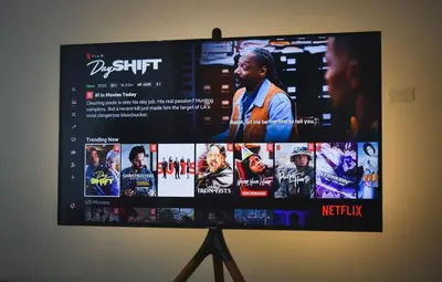 a flat screen tv on a stand on a wall at Kael Studio in Manila