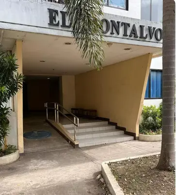 a building with stairs and a sign on it at At Home in Santa Rosa in Santa Rosa