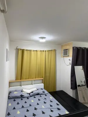 a bedroom with a bed with stars on it at At Home in Santa Rosa in Santa Rosa