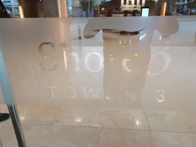 a glass window with a sign that reads spock new at Yammy's HomeyStyle Condo at Tower 3 Shore 3 Residences in Manila