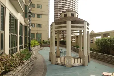 a gazebo in the middle of a building at Luxury Condo at Forbeswood Parklane The Fort BGC in Manila