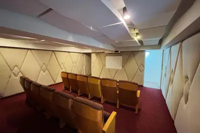 a row of chairs in a waiting room at Extremeli Suites in Manila