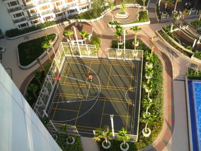 an aerial view of a tennis court in a park at Extremeli Suites in Manila