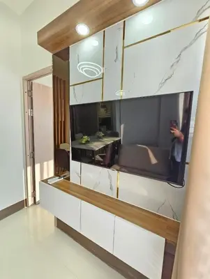 a person taking a picture of a living room at Stunning 2 Bedroom near Airport in Manila