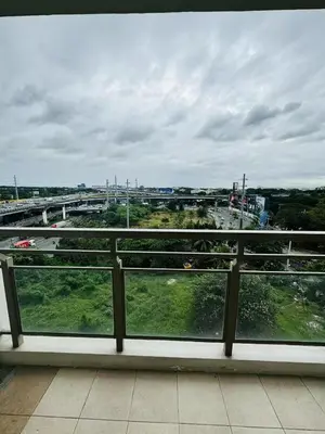 a view of a city from a balcony at Near NAIA 3 Condo in Manila