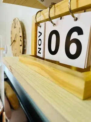a sale sign on top of a wooden shelf at Fablo Getaway Staycation Beside Enchanted Kingdom in Santa Rosa