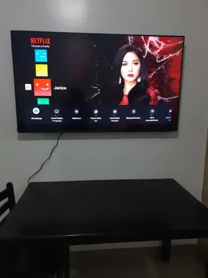 a flat screen tv hanging on a wall at shore 2 tower 1 in Manila