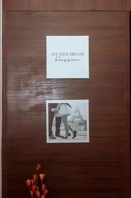 a sign on a door with a picture of a man at Air Residence Penthouse 59 Suite Gym Swim Park 300 mbps in Manila