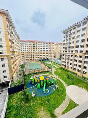 an aerial view of a playground in a apartment complex at 2BR Relaxing Oasis with pool access Sorrento Oasis in Manila