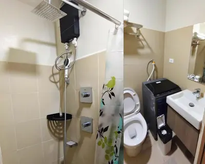 a bathroom with a toilet and a sink at Las Vegas of the Philippines in Pasay Manila Luxury Near NAIA Airport x Solaire x Okada x City of Dreams and Casinos Enjoy FREE Pool Access n HighSpeed WIFI and Netflix Comfort with ResortType Living Secure Your Limited Offer This Month in Manila