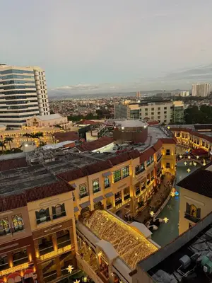 an overhead view of a city with buildings and a harbor at Spacious Staycation with venice grand canal view in Manila