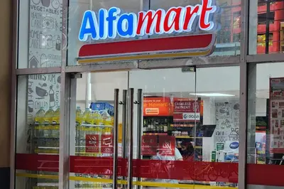 a store with an air mart sign in the window at Cozy Pool & City View 1br Apt in Makat with Netflix in Manila
