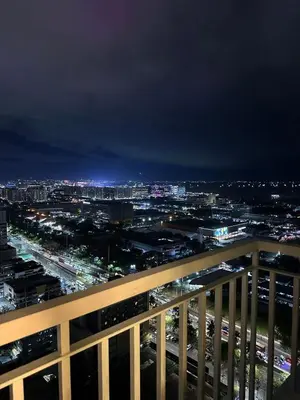 a view of a city at night at Jessa Rios Coast Staycation in Manila