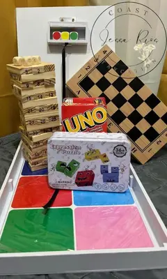 a game table with toys and a chess board at Jessa Rios Coast Staycation in Manila