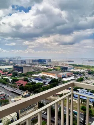 a view of a city from a balcony at Jessa Rios Coast Staycation in Manila
