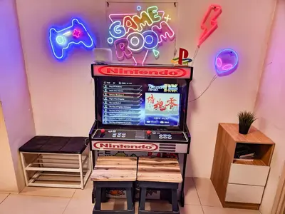 a display of a video game in front of a wall at Gaming 2br in Makati with City View Arcade Netflix in Manila