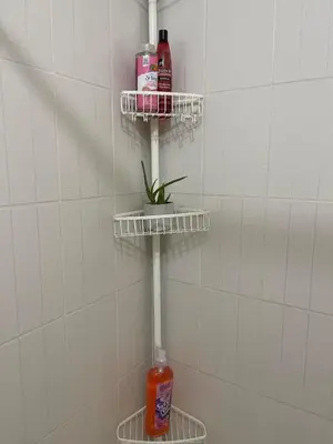 a bathroom with two shelves on the wall with a drink at 52sqmComfy2BR and 2BA Resort-inspired Flair Towers Condo in Manila