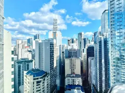 a view of a large city with tall buildings at City Scape Comforts Makati in Manila