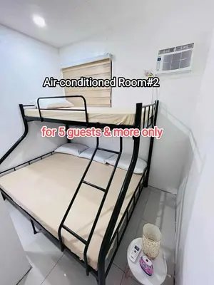 a bedroom with a bunk bed in a room at Casa Viana - Modern House Upto 300mbps Wi-fi with Netflix, FREE Parking in Cabuyao