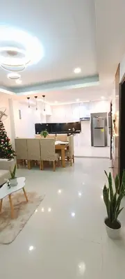 a large living room with a table and chairs at Casa Viana - Modern House Upto 300mbps Wi-fi with Netflix, FREE Parking in Cabuyao