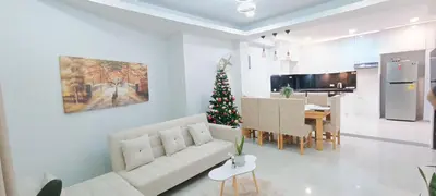 a living room with a christmas tree and a couch at Casa Viana - Modern House Upto 300mbps Wi-fi with Netflix, FREE Parking in Cabuyao