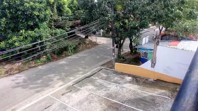 an overhead view of a balcony of a house at The Palines Apartment Hotel near Brittany Palazzo Villar City in Manila
