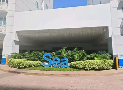 a sap sign in front of a building at Sea Residences Tower E in Manila