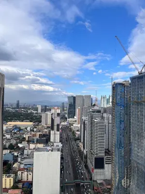 a view of a city with many tall buildings at Loft in Boni - Work friendly - Cityview - up to 8pax in Manila