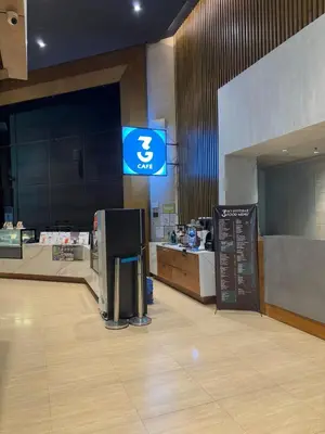 a store with a sign on the wall and a counter at Loft in Boni - Work friendly - Cityview - up to 8pax in Manila