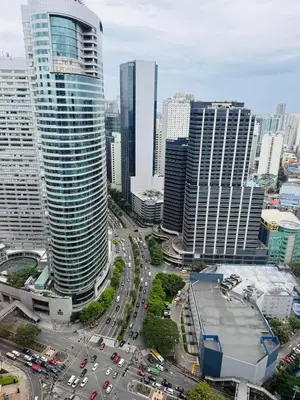 an aerial view of a city with tall buildings at Air Residences - Elevate Escapes Makati, central location in Manila