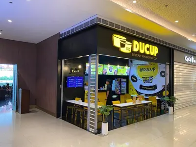 a dud up restaurant in a shopping mall at Family Oasis Makati 2 bedroom 1 kiddo room 300 mbps Fast Net in Manila