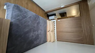 a room with a large door and a closet at Ohana Staycation in Manila