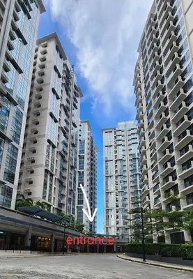 two tall buildings with an airplane sign in between them at 14F BGC Unit 3 mins Walk to The Venice Grand Canal Mall Pet Friendly in Manila
